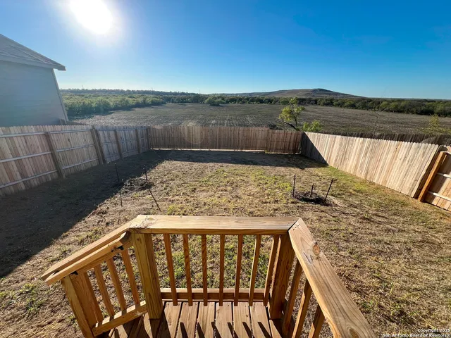 a view of backyard of house