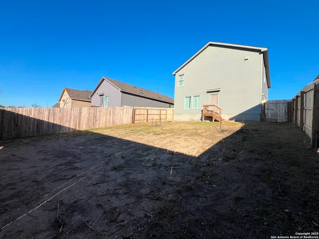 a view of a swimming pool with a chairs