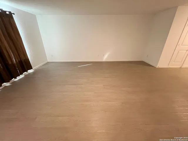 a kitchen with stainless steel appliances a refrigerator stove microwave and cabinets