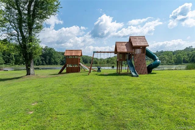 a view of a park with large trees