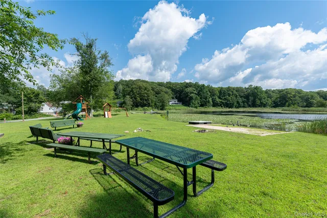 a view of a lake with a big yard