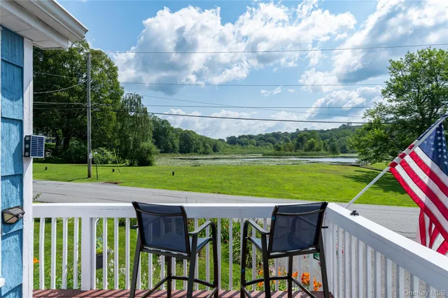 a view of a chair and table on the terrace