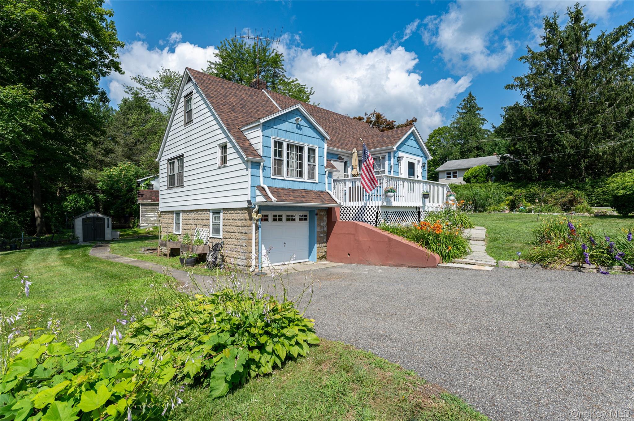 1 Shady Lane Mahopac, NY 10541 - Photo 21 of 22 a view of a house with a yard and potted plants