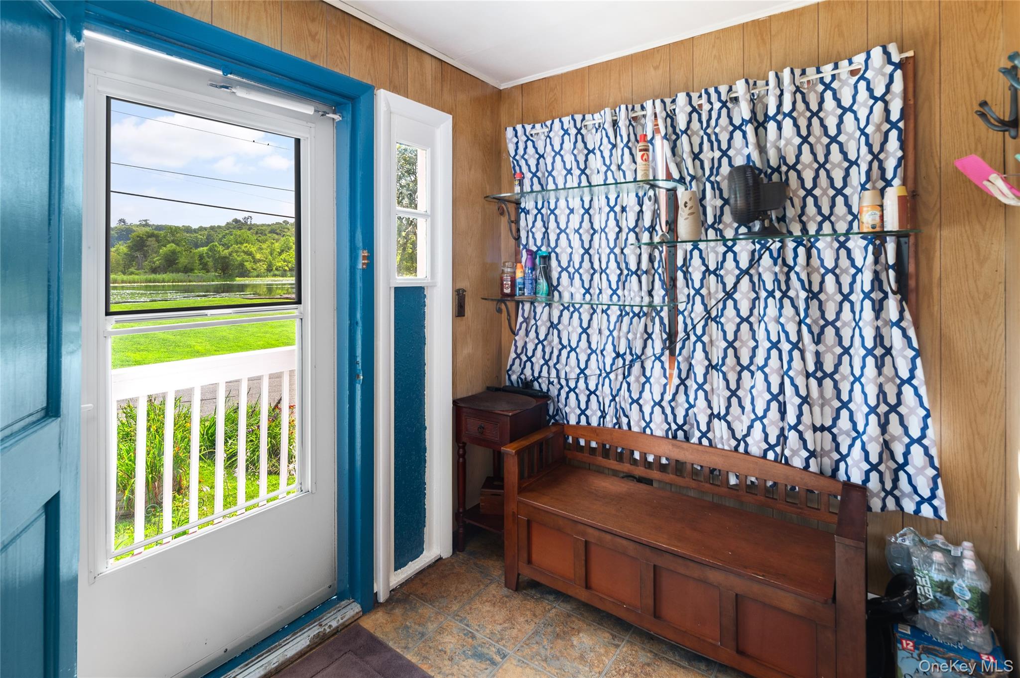 1 Shady Lane Mahopac, NY 10541 - Photo 4 of 22 a view of a porch with a bench