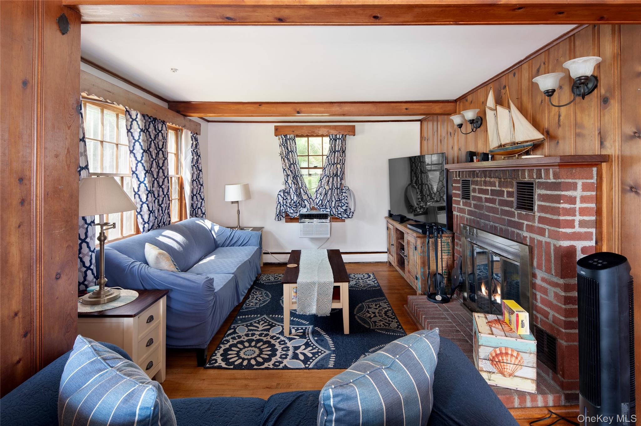1 Shady Lane Mahopac, NY 10541 - Photo 10 of 22 a living room with furniture fireplace and a large window