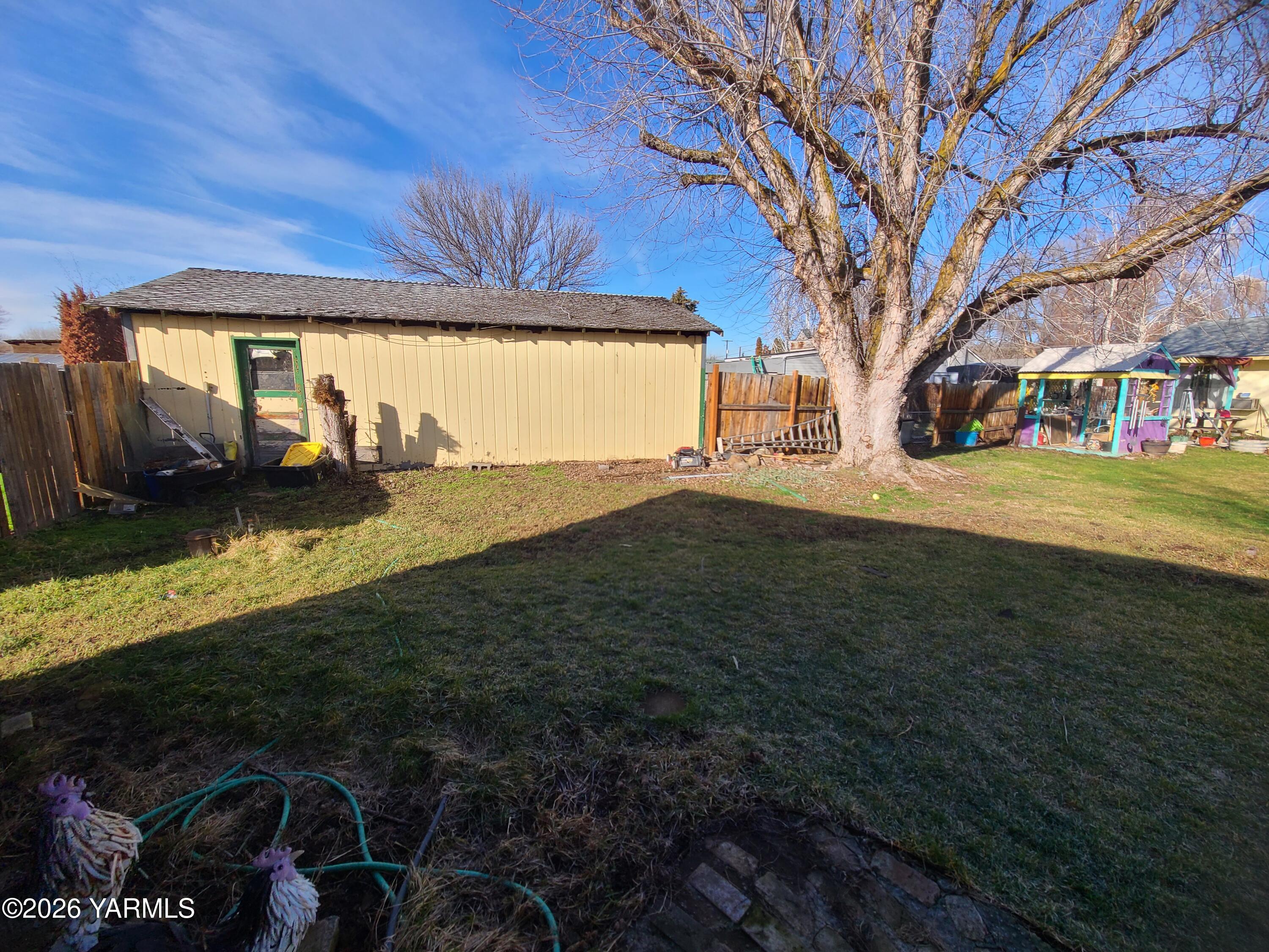 10608 Hackett Road Yakima, WA 98903 - Photo 14 of 25 a view of a yard with an outdoor space