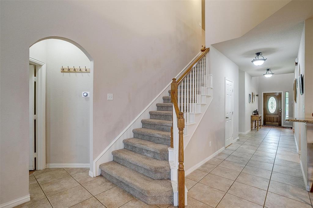 2536 Glenn Ranch Drive Burleson, TX 76028 - Photo 12 of 40 a view of a hallway view with staircase