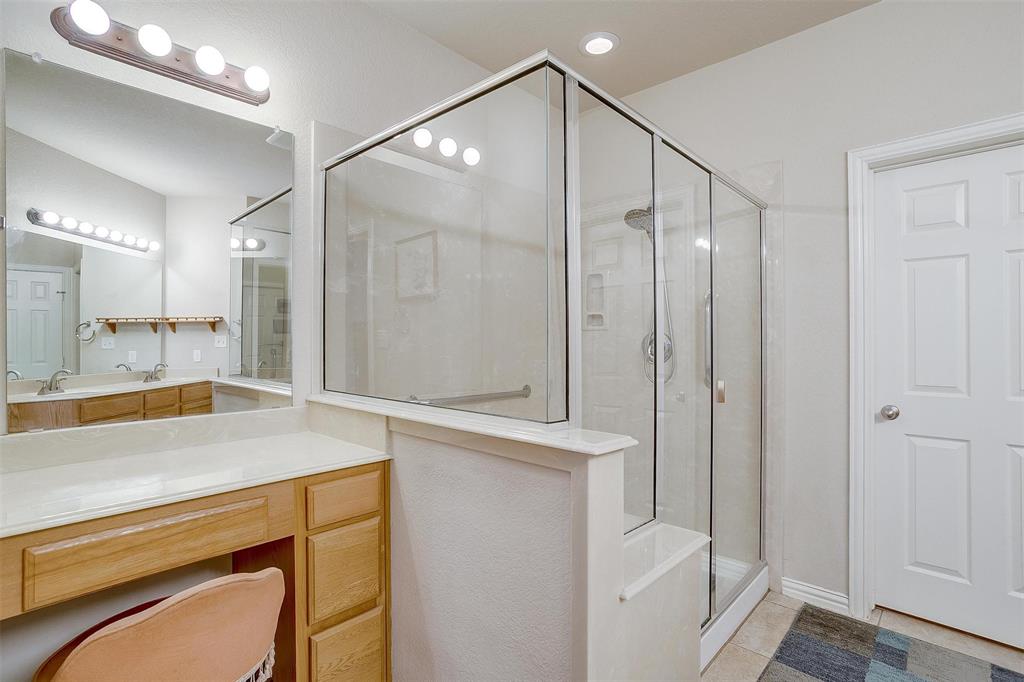 2536 Glenn Ranch Drive Burleson, TX 76028 - Photo 20 of 40 a bathroom with a shower sink and mirror