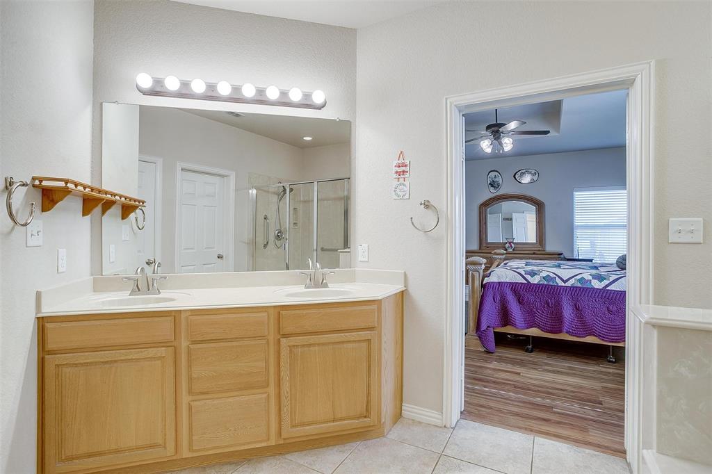 2536 Glenn Ranch Drive Burleson, TX 76028 - Photo 21 of 40 a en suite bathroom with 2 sink and a mirror