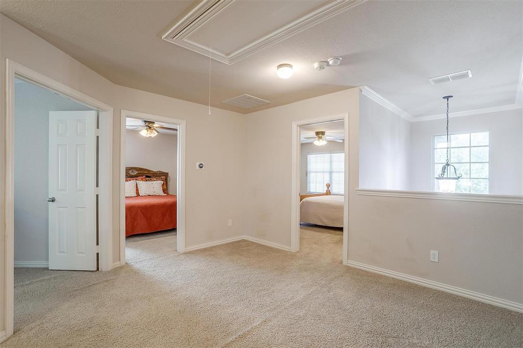 2536 Glenn Ranch Drive Burleson, TX 76028 - Photo 24 of 40 a bedroom with a bed and a large window