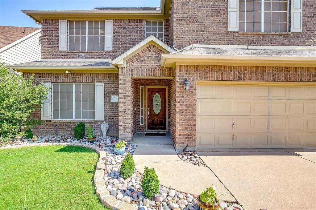2536 Glenn Ranch Drive Burleson, TX 76028 - Photo 3 of 40 a front view of a house with garden
