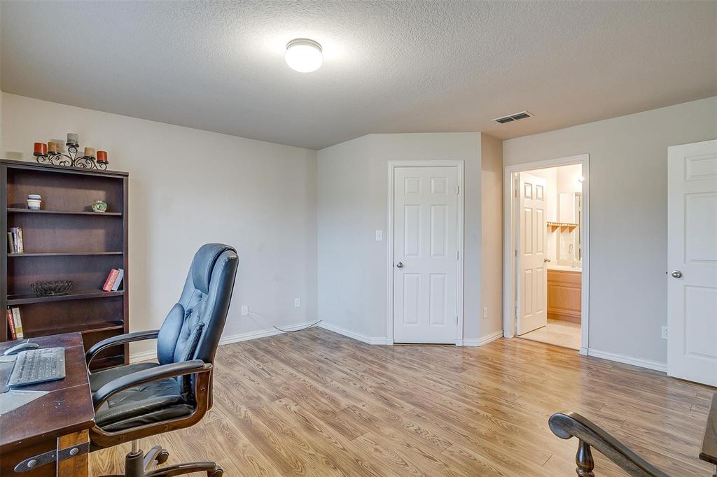 2536 Glenn Ranch Drive Burleson, TX 76028 - Photo 34 of 40 a view of a workspace with furniture and wooden floor