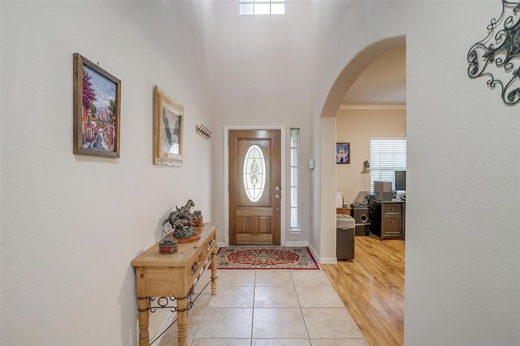 2536 Glenn Ranch Drive Burleson, TX 76028 - Photo 4 of 40 a bathroom with a sink and a mirror
