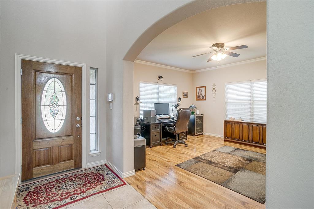2536 Glenn Ranch Drive Burleson, TX 76028 - Photo 5 of 40 a living room with furniture a rug and white walls