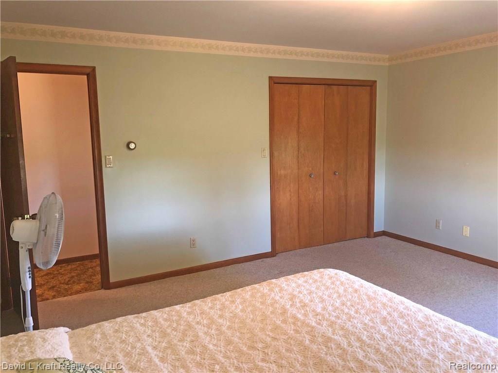 7889 Pigeon Road Pigeon, MI 48755 - Photo 13 of 28 7889PigeonRdBed1Closet.jpg