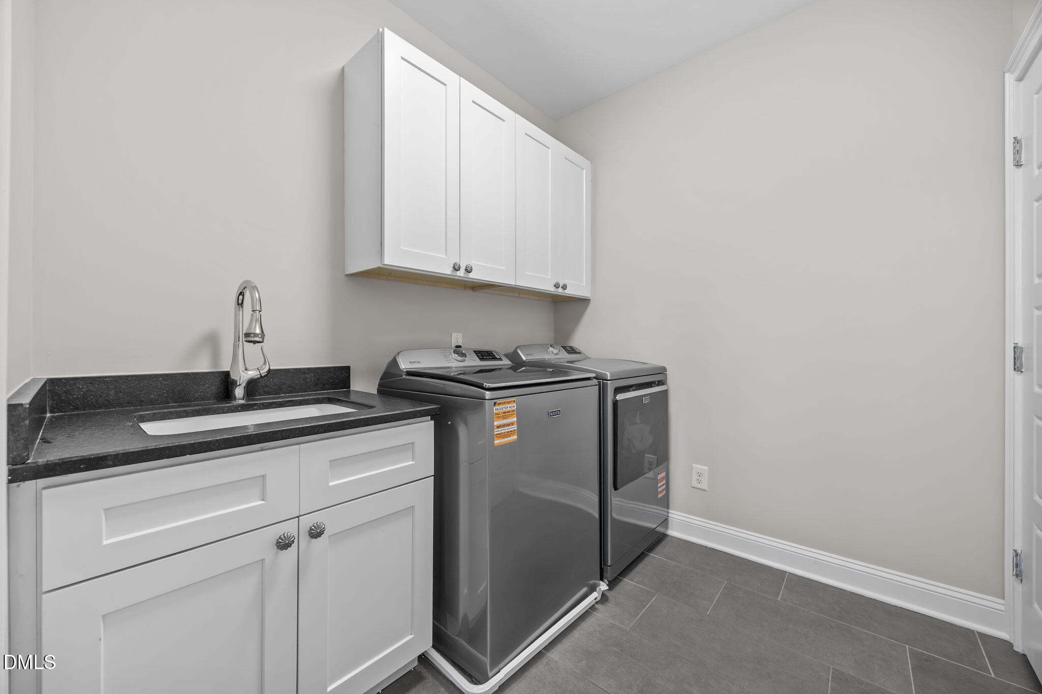 626 East Whitaker Mill Road Raleigh, NC 27608 - Photo 22 of 51 2nd floor laundry w/ closet