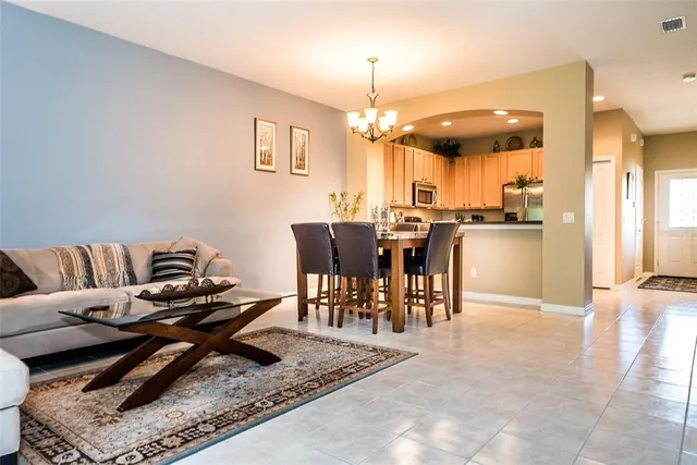 a view of a dining room with furniture
