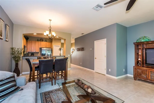 a view of a livingroom with furniture window and wooden floor