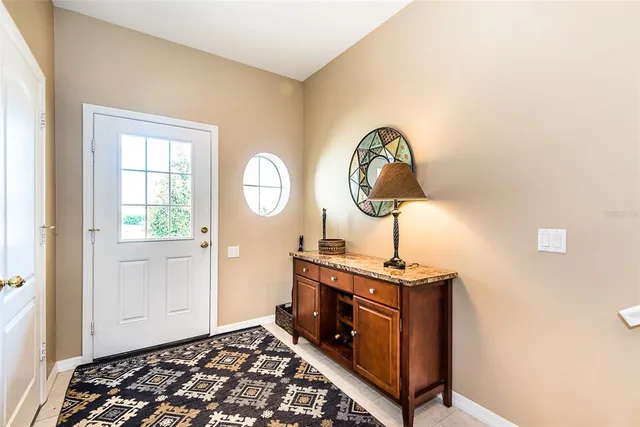 a room with a table and a mirror