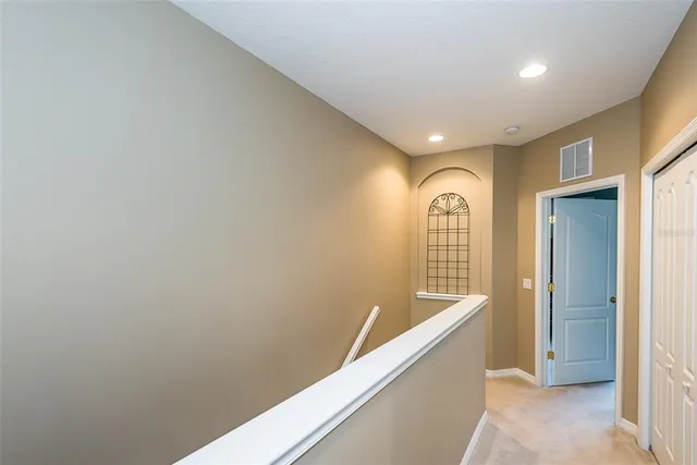 a view of entryway with bathroom