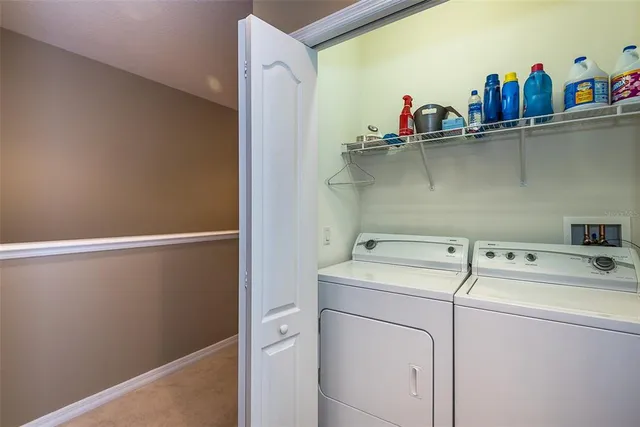 a utility room with dryer and washer