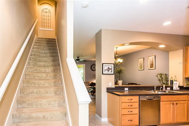 a view of a bathroom with sink and mirror