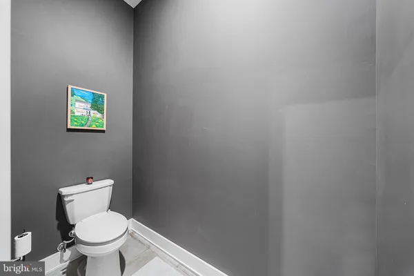 a view of a bathroom with dual sinks