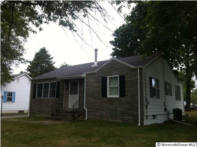 76 Freehold Road Manalapan, NJ 07726 - Photo 1 of 3 a view of house with backyard
