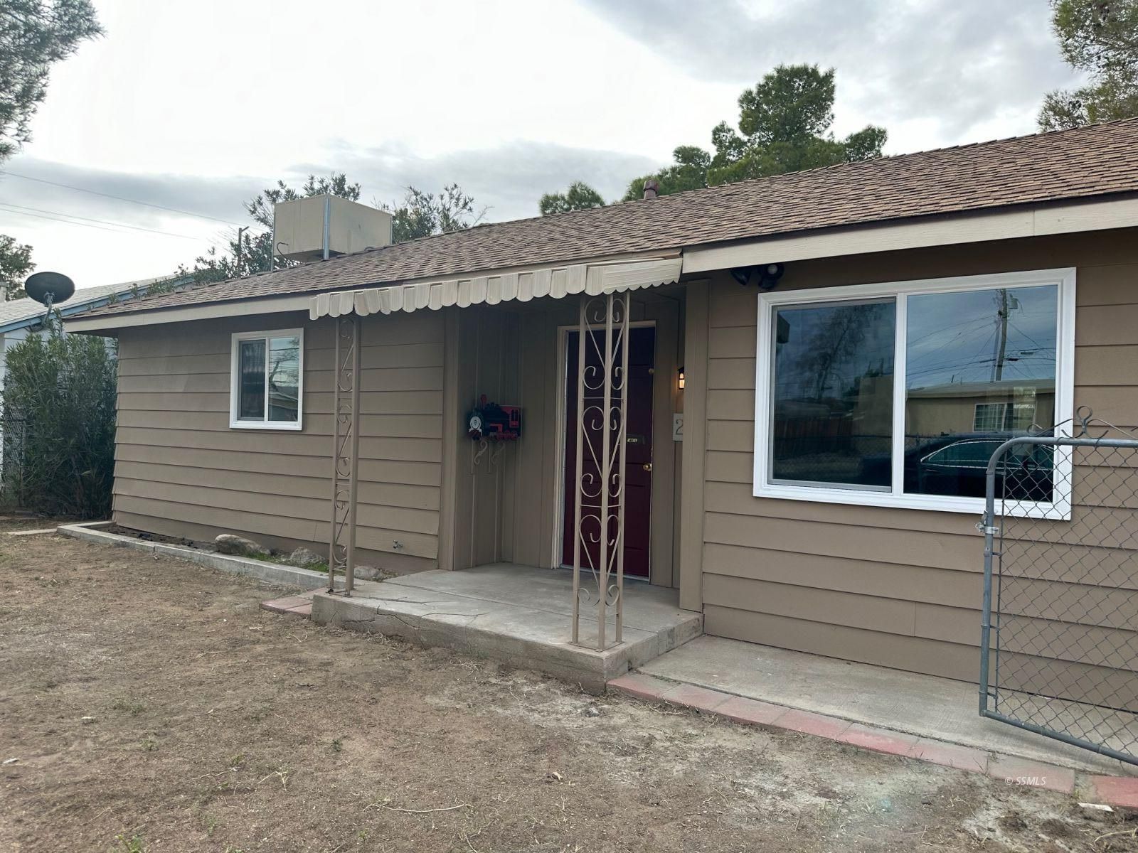 237 South Fire Opal Street Ridgecrest, CA 93555 - Photo 2 of 9 a view of a house with a window