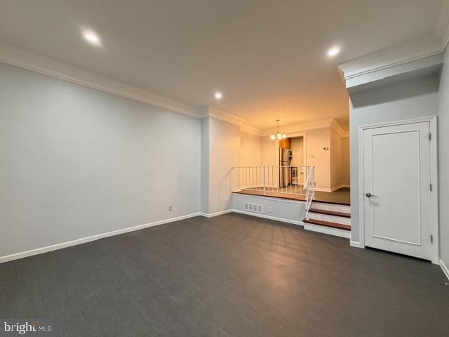 5915 Kingsford Road, Unit 365 Springfield, VA 22152 - Photo 11 of 28 an empty room with a cabinet and mirrors