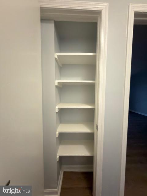 5915 Kingsford Road, Unit 365 Springfield, VA 22152 - Photo 14 of 28 a view of walk in closet with empty racks