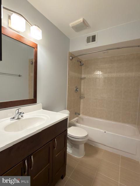 5915 Kingsford Road, Unit 365 Springfield, VA 22152 - Photo 15 of 28 a bathroom with a sink a toilet and shower