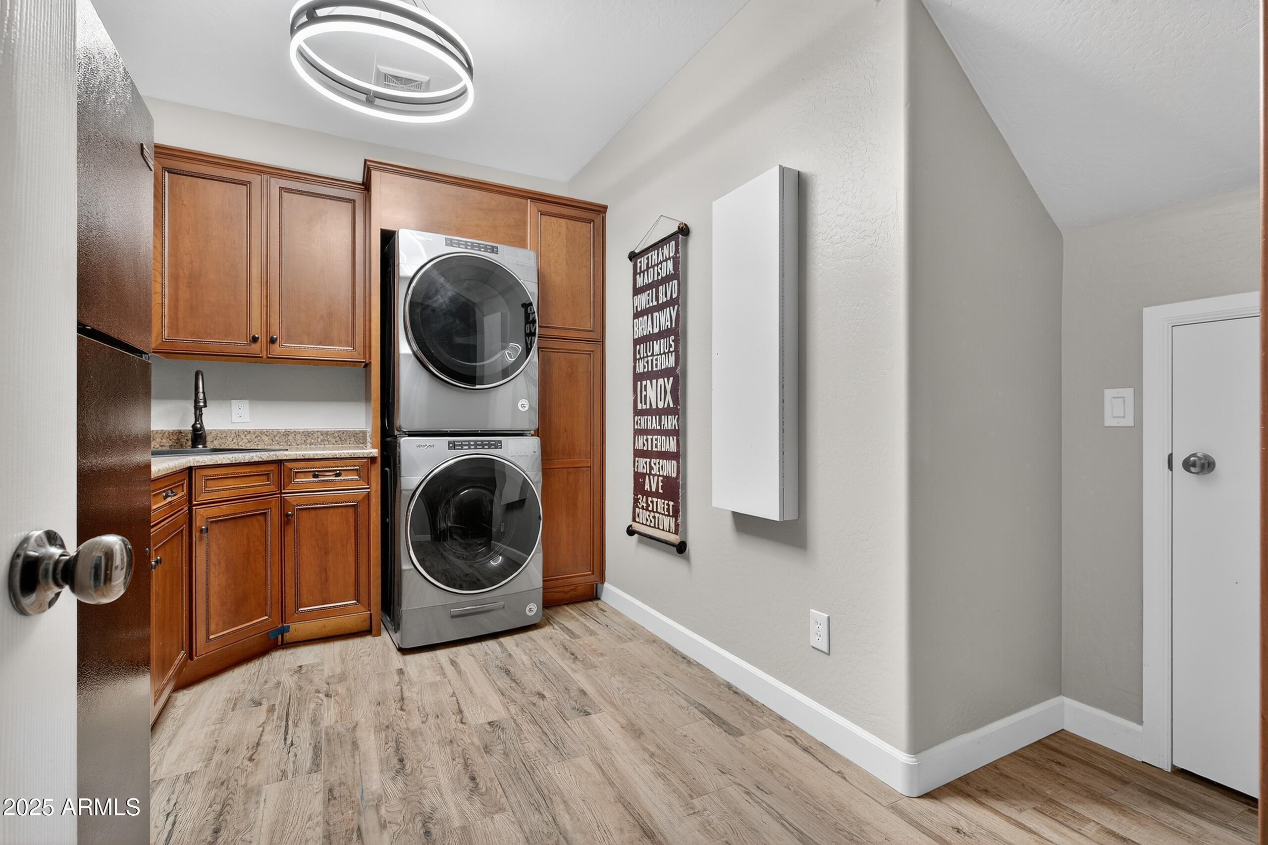 3021 East Agritopia Loop North Gilbert, AZ 85296 - Photo 39 of 68 a view of a kitchen with washer and dryer