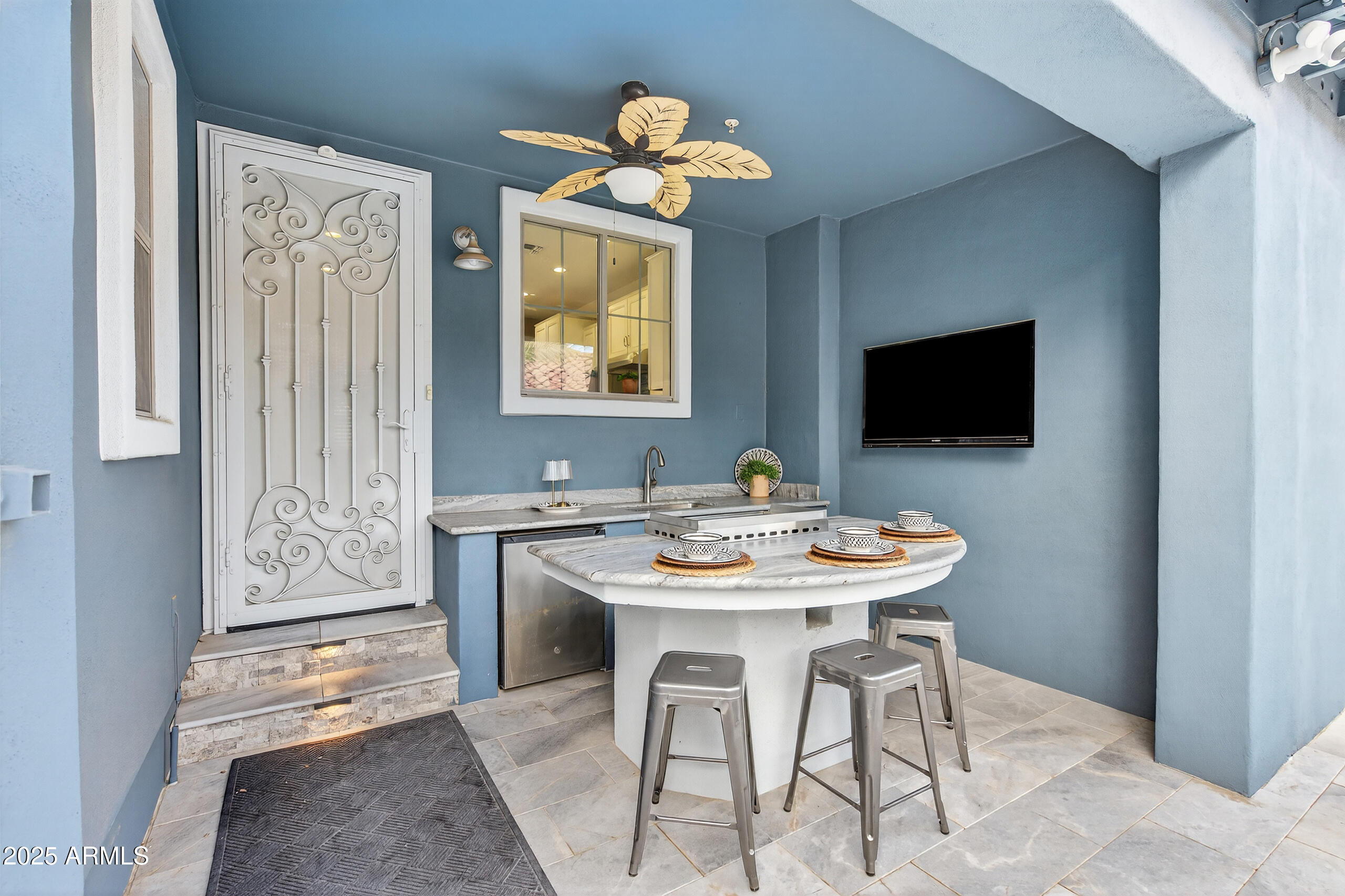 3021 East Agritopia Loop North Gilbert, AZ 85296 - Photo 50 of 68 a view of a dining room with furniture and wooden floor