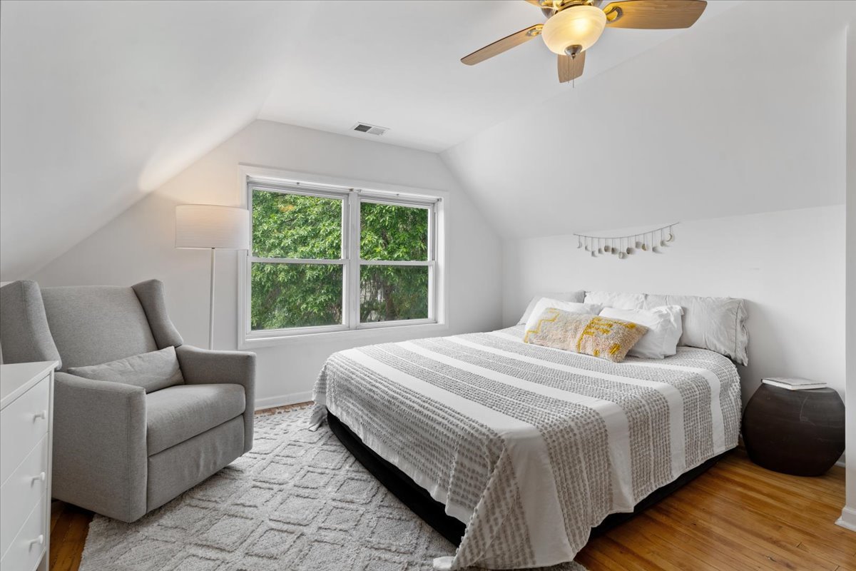 2735 North Ridgeway Avenue Chicago, IL 60647 - Photo 16 of 40 a bedroom with bed and window