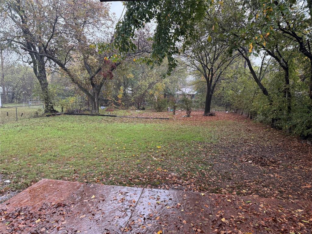 1007 Westway Street Denton, TX 76201 - Photo 15 of 15 a view of a yard with a tree