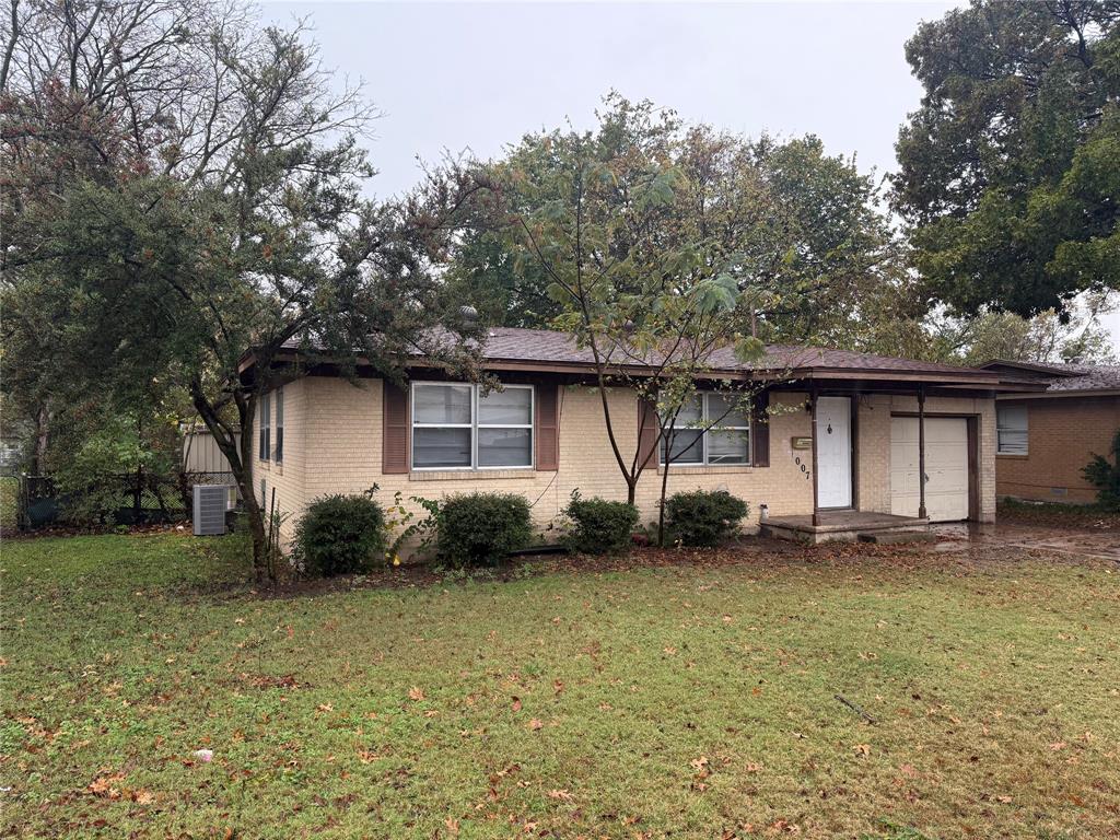 1007 Westway Street Denton, TX 76201 - Photo 2 of 15 a view of a house with a yard
