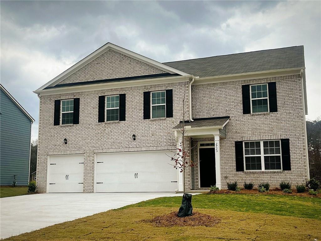 2740 Piper Drive Atlanta, GA 30331 - Photo 1 of 1 a front view of a house with a yard