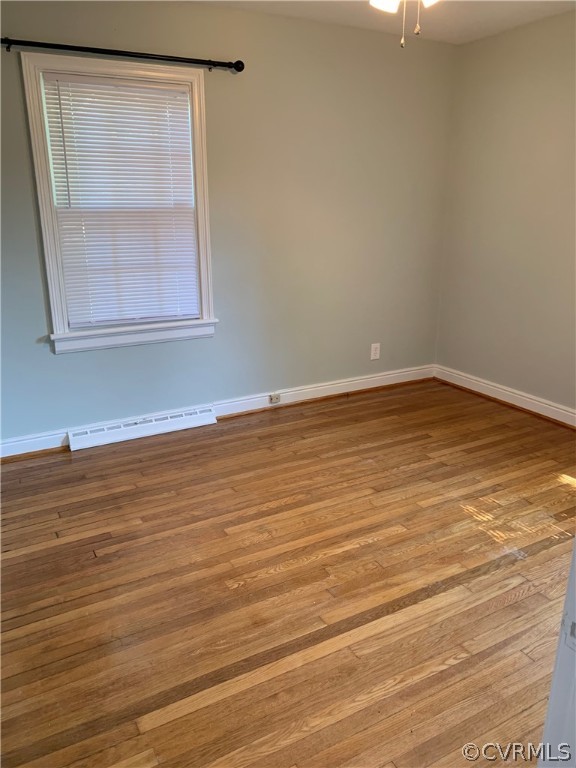 5254 Tilford Road Richmond, VA 23225 - Photo 6 of 13 a view of a room with wooden floor and cabinet