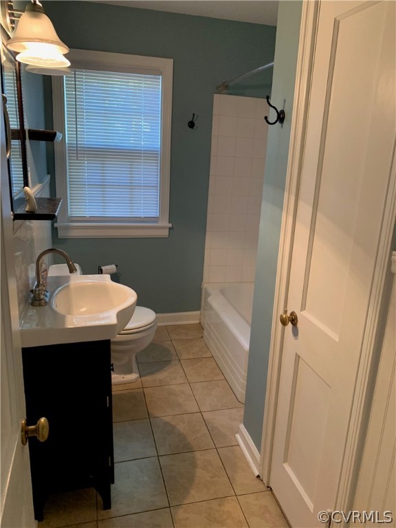 5254 Tilford Road Richmond, VA 23225 - Photo 10 of 13 a bathroom with a sink a mirror and a shower