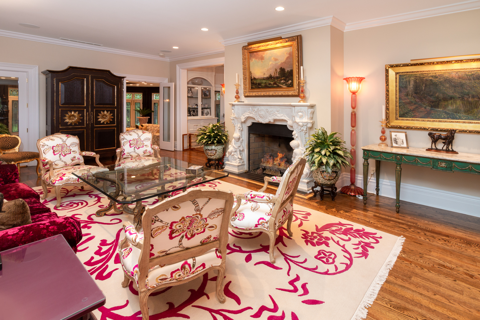 201 Scottswood Road Riverside, IL 60546 - Photo 13 of 75 a living room with furniture a flat screen tv and a fireplace