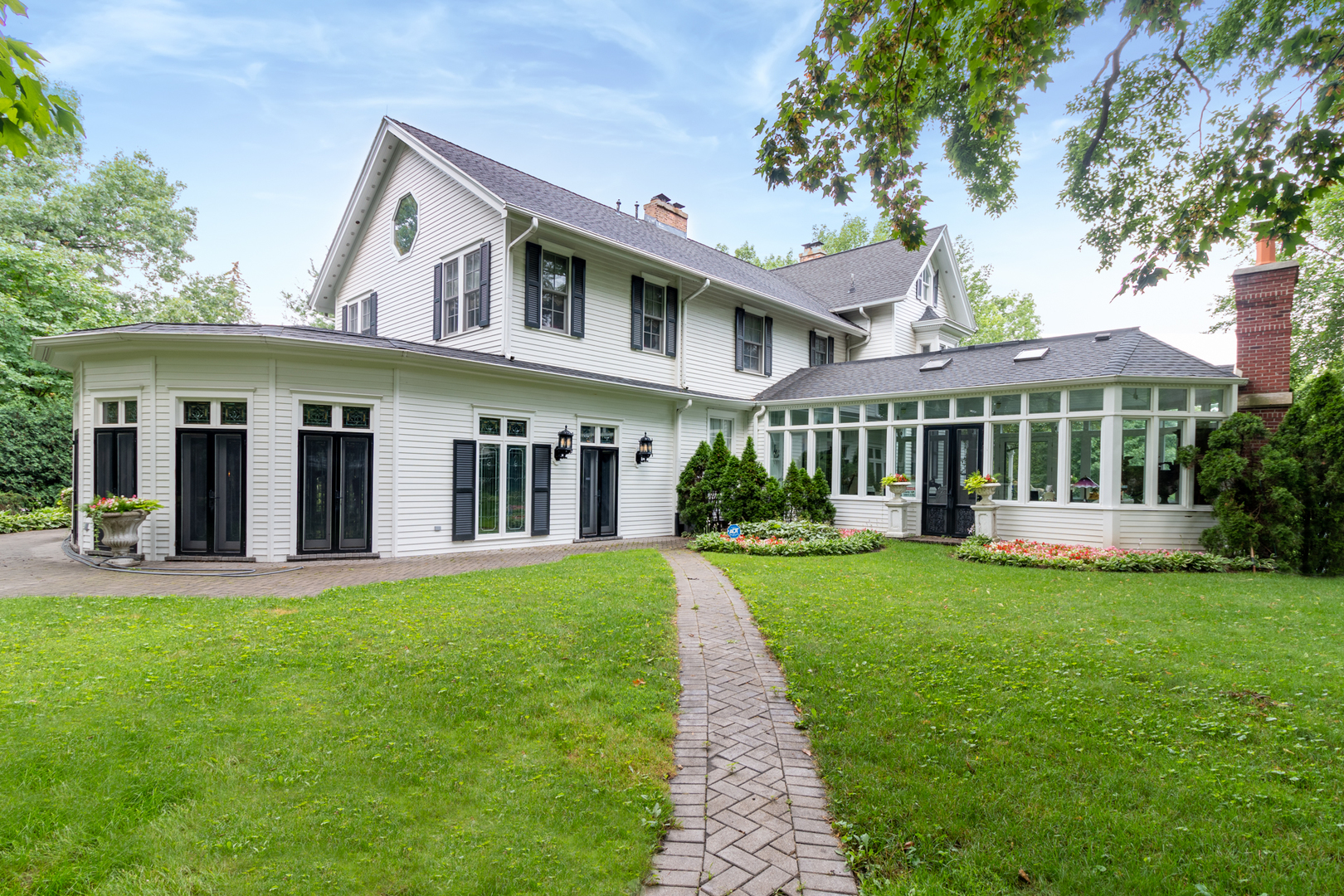 201 Scottswood Road Riverside, IL 60546 - Photo 3 of 75 a front view of a house with a yard