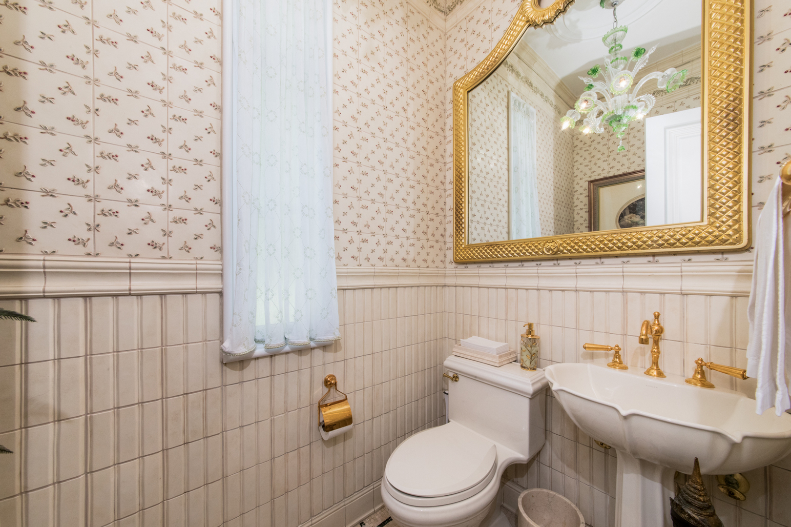 201 Scottswood Road Riverside, IL 60546 - Photo 33 of 75 a white toilet sitting next to a bathroom sink