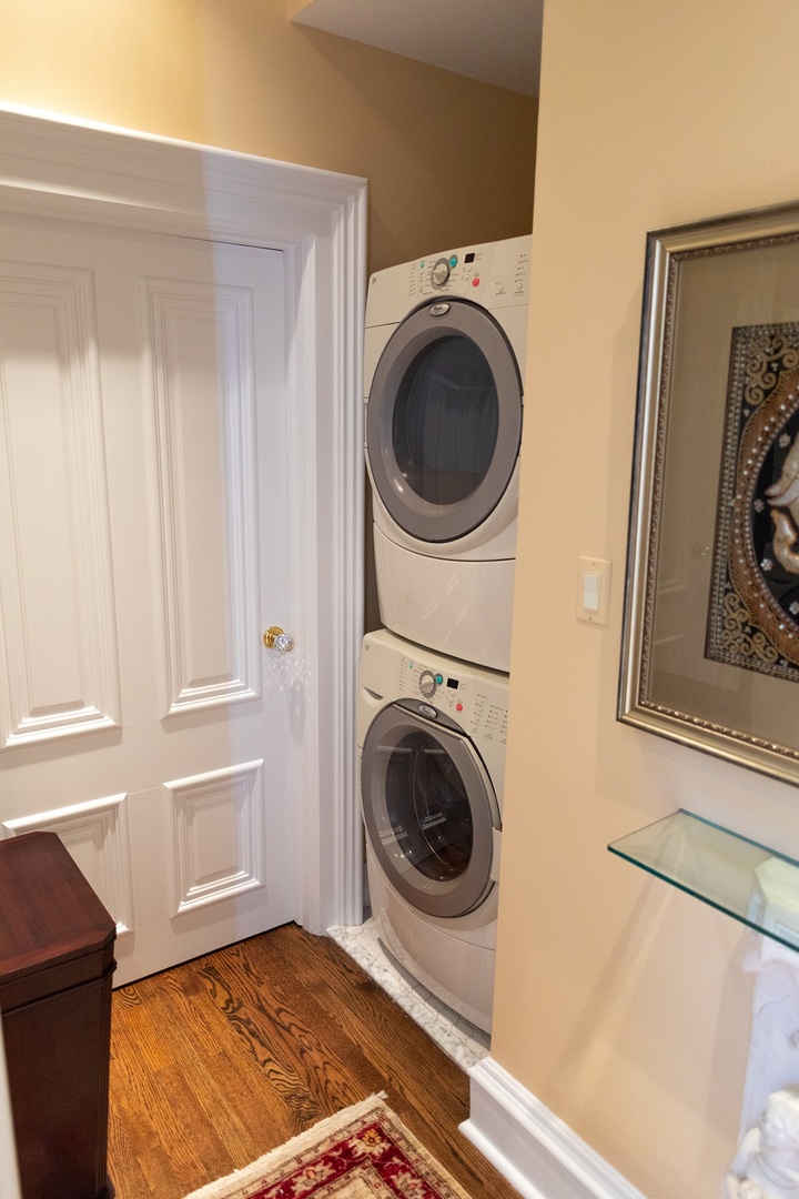 201 Scottswood Road Riverside, IL 60546 - Photo 48 of 75 a view of a storage & utility room with a washer dryer