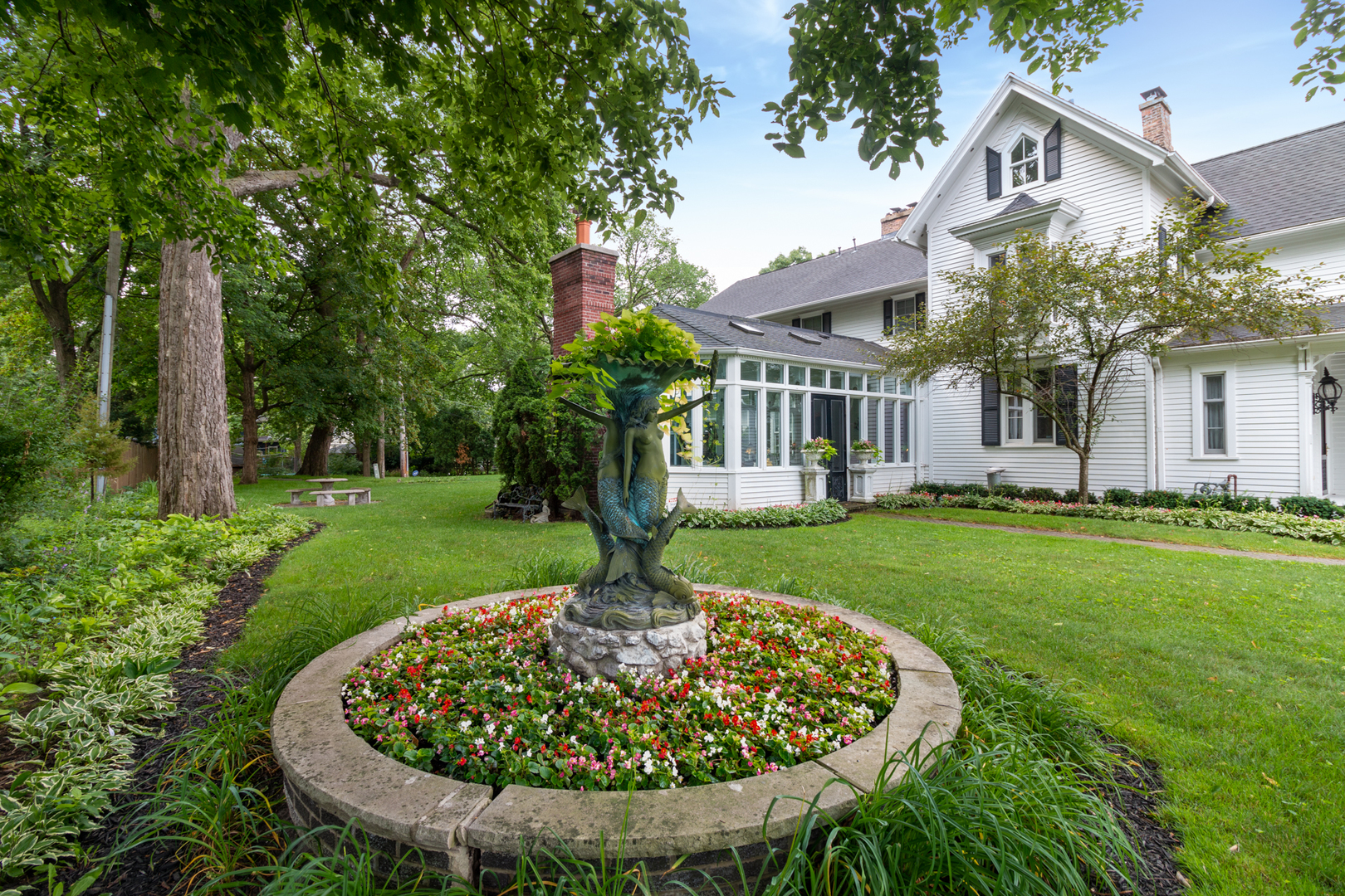 201 Scottswood Road Riverside, IL 60546 - Photo 6 of 75 a view of a house with a small yard