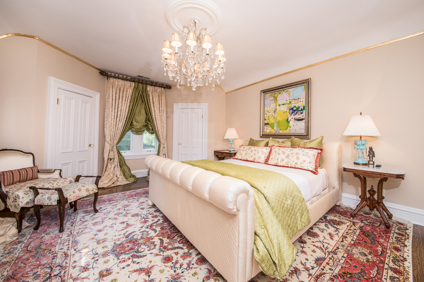 201 Scottswood Road Riverside, IL 60546 - Photo 55 of 75 a bedroom with a bed and a chandelier