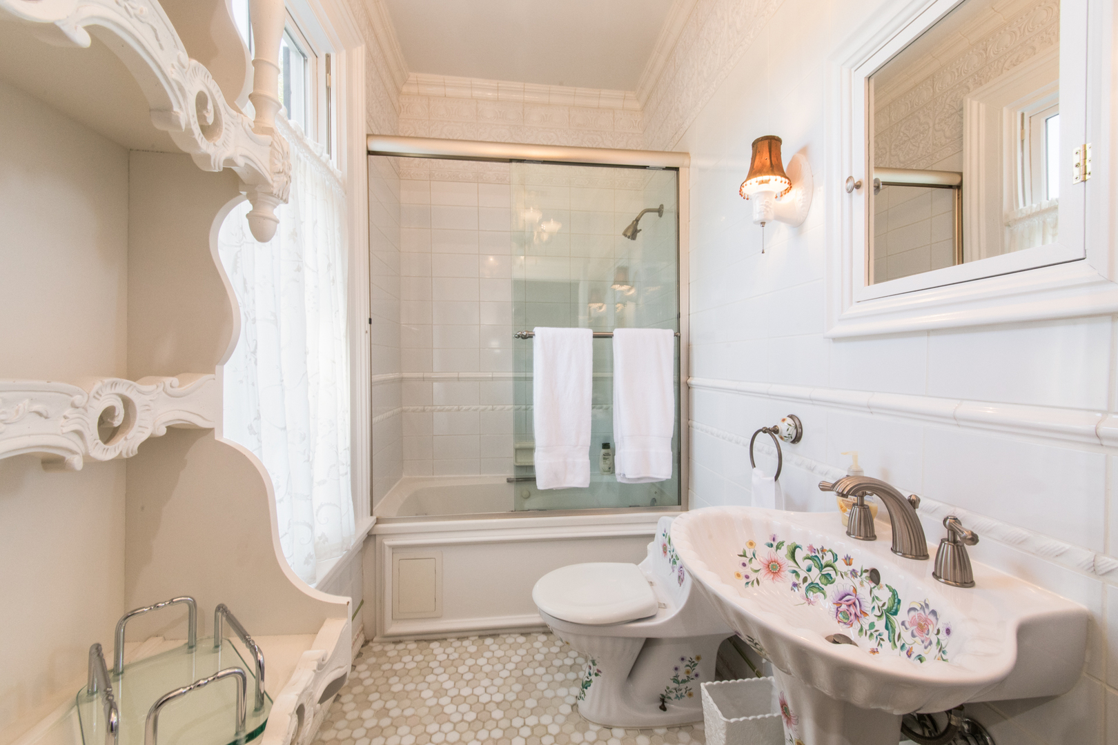 201 Scottswood Road Riverside, IL 60546 - Photo 57 of 75 a bathroom with a sink and mirror with bathtub
