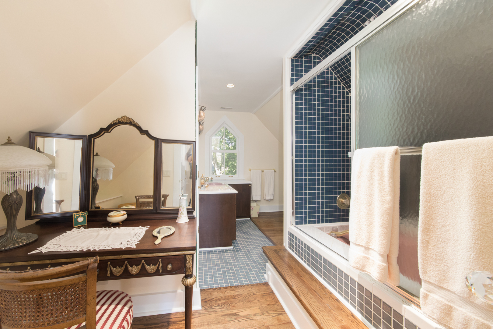 201 Scottswood Road Riverside, IL 60546 - Photo 61 of 75 a living room with furniture a flat screen tv and a floor to ceiling window