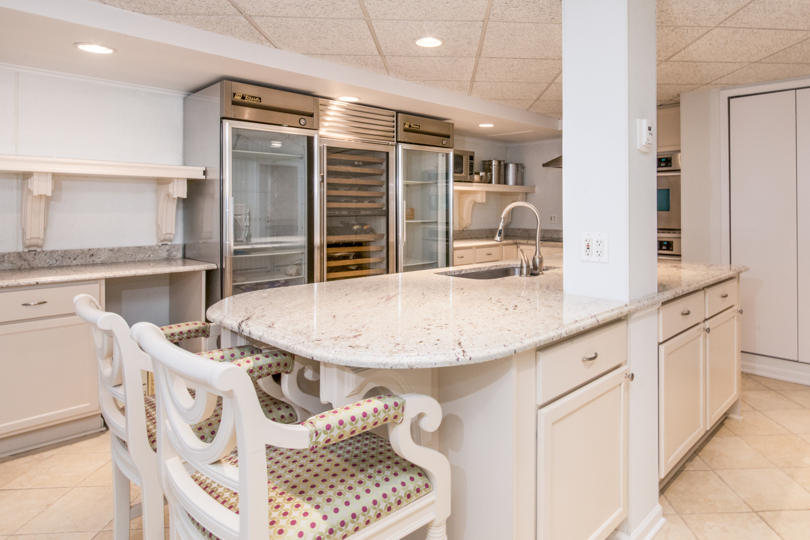 201 Scottswood Road Riverside, IL 60546 - Photo 64 of 75 a kitchen with stainless steel appliances kitchen island granite countertop a sink and cabinets
