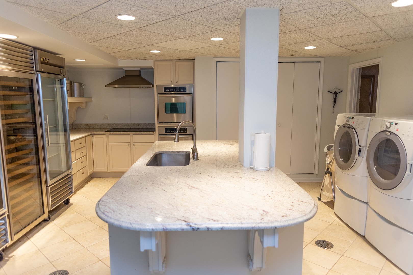 201 Scottswood Road Riverside, IL 60546 - Photo 65 of 75 a kitchen with stainless steel appliances granite countertop a sink a stove and a refrigerator